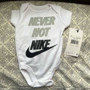 Nike White and Black Bodysuit with Iconic Swoosh